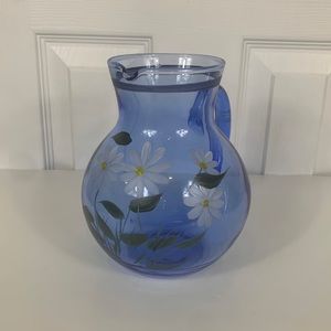 Blue small water pitcher with hand painted daisy’s, with handle